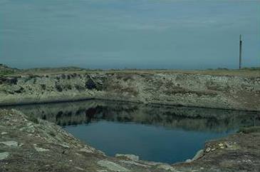 Photo of the Rocket Pole Pond (J J George).
The pond is formed in an old quarry trial pit and 
home to a number of Crucian Carp.