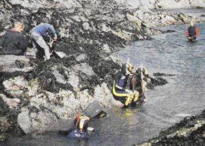 Photo of visitors to the snorkelling trail
in the Marine Nature Reserve (R A Irving).